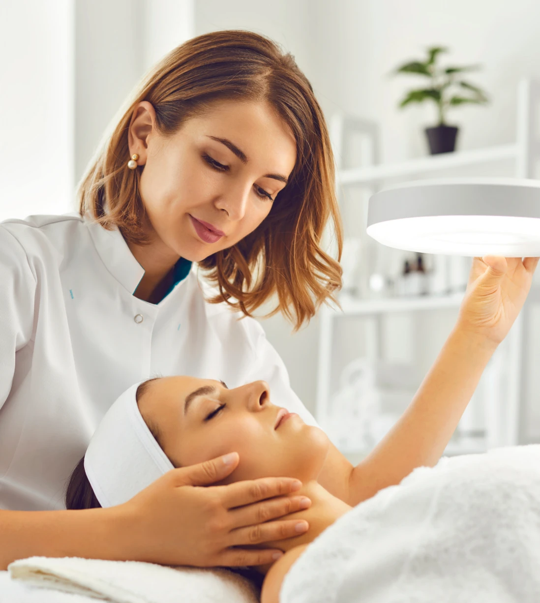 Skincare specialist performing facial treatment